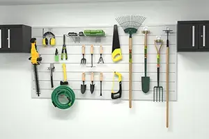 A wall-mounted garden tool organizer featuring various tools, including rakes, trowels, shears, a hose, a hedge trimmer, and gardening gloves. Tools are neatly arranged on horizontal slats between two black storage cabinets.