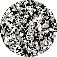 A circular pattern featuring a mix of randomly scattered black, white, and gray confetti-like pieces, creating a speckled texture. The pieces vary in shape and size, giving the design a dynamic and visually interesting appearance.