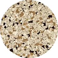 This image shows a close-up of a circular pattern composed of variously-sized beige, brown, and black flakes, resembling a terrazzo or speckled surface.