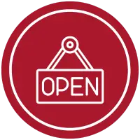 A red circle icon with a white outline of a hanging sign reads "OPEN" in capital letters, symbolizing the first step towards franchise ownership.