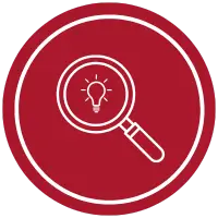 A red circular icon featuring a white outline of a magnifying glass, with a small light bulb inside symbolizing franchise insights. The icon is enclosed within a crisp white border.