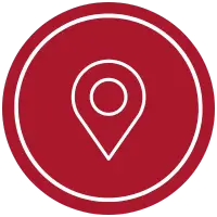 A red location pin icon inside a white circle with a red background perfectly symbolizes the first steps to ownership.